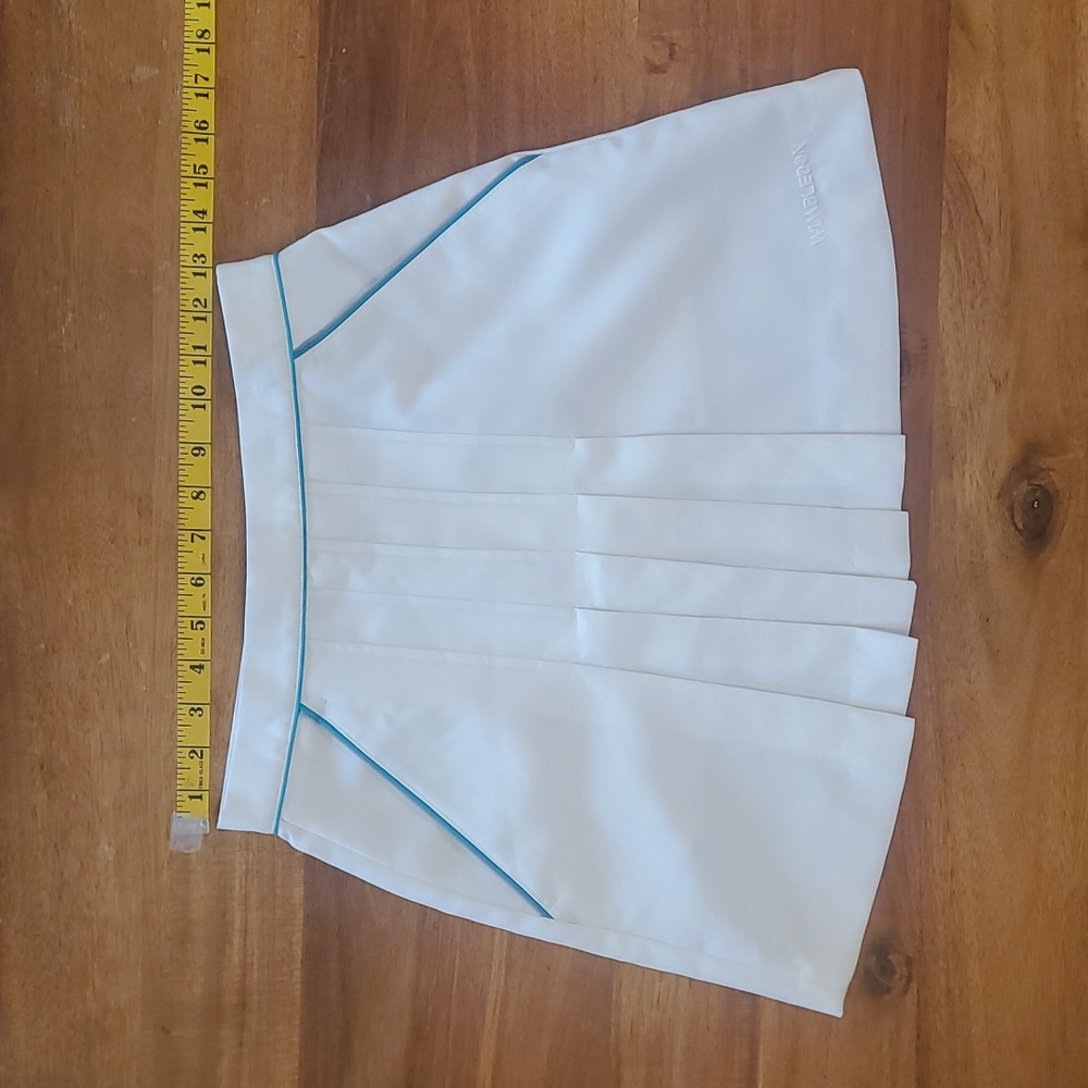 White Wimbledon tennis skirt.